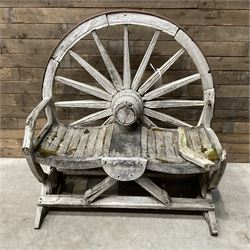 Early 20th century timber framed cartwheel garden bench