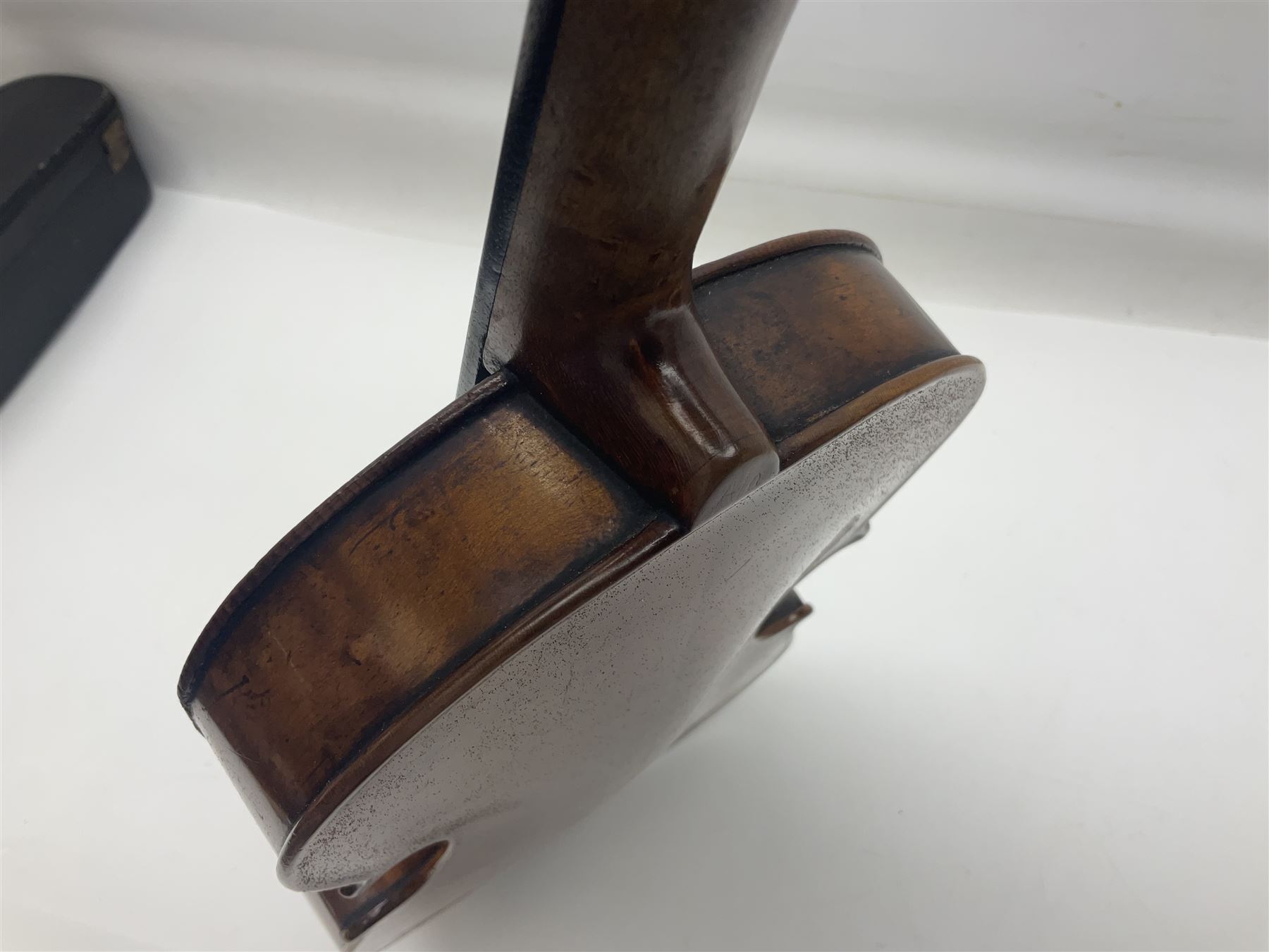 Late 19th century German trade violin c1890 with 36cm two-piece birds-eye maple back, neck and ribs and spruce top; bears label 'Manufactured in Berlin Special Copy of Nicolaus Amati' L59.5cm; in carrying case