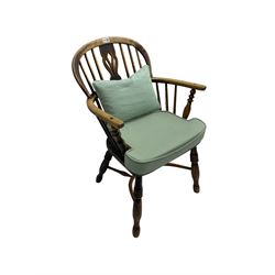 Late 19th century elm Windsor armchair, stick back with pierced and fretwork splat, turned supports joined by crinoline stretcher