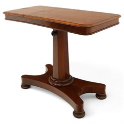 William IV mahogany reading table, the rectangular top with rounded corners and moulded edge, one end fitted with two hinged adjustable reading slops with two rests, the sliding top with a sprung stay mechanism, supported on a single tapered faceted column  with turned collar on a quatreform base with compressed bun feet
