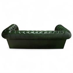 Late 20th century chesterfield style sofa upholstered in green leather, with deep buttoned back and arms above three loose cushions, continuous scroll arms and front, on concealed block feet