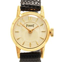 Piaget ladies 18ct gold manual wind wristwatch, silvered / champagne engine turned dial with dagger hour markers, back case No. 5635, Birmingham import mark 1956 with Helvetia hallmark, on black leather strap