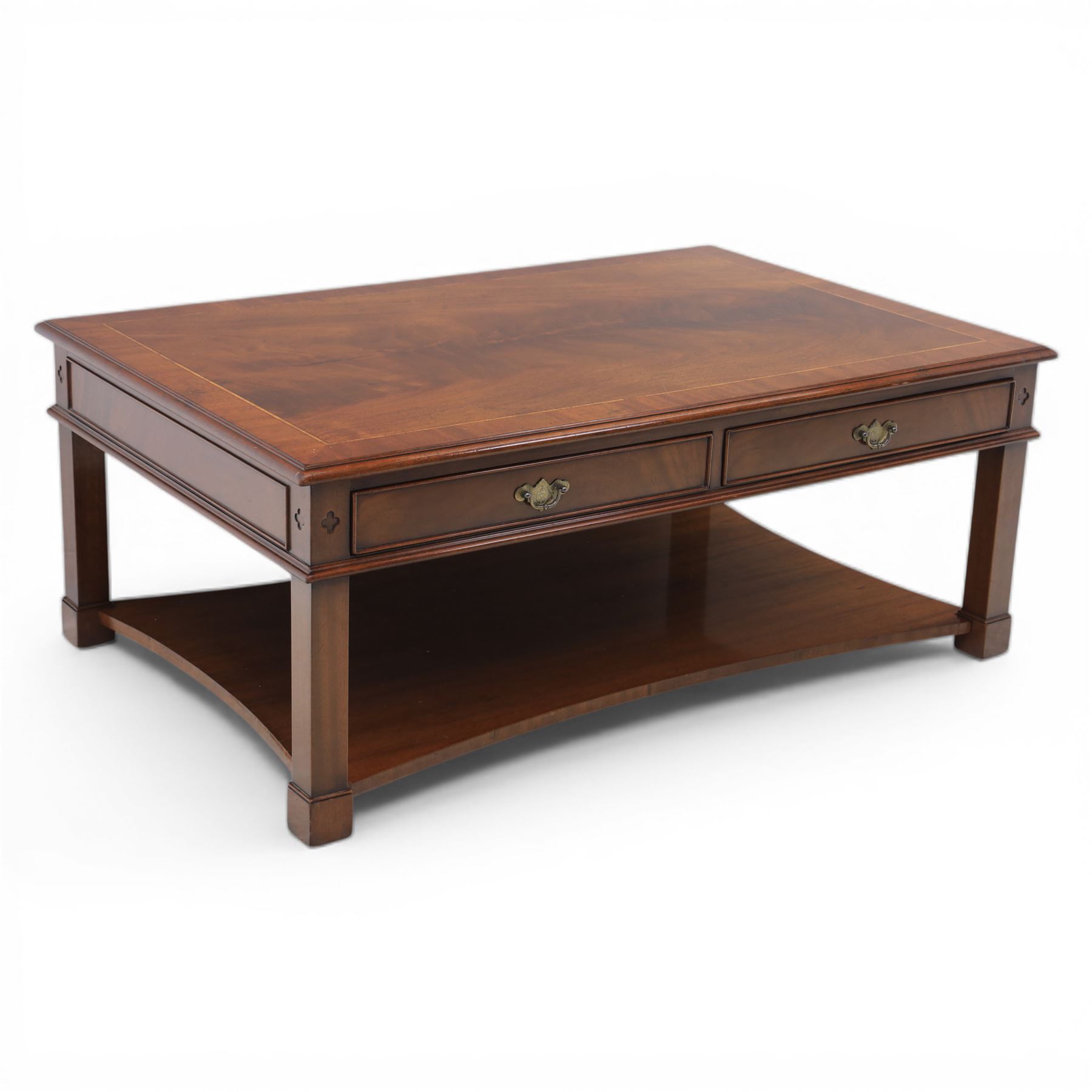 Georgian style mahogany coffee table, rectangular moulded top with crossbanded border and line inlay, fitted with two cock-beaded frieze drawers with ornate brass swan neck handles and shaped backplates, opposing false drawer fronts, raised on square tapering supports united by a concave undertier