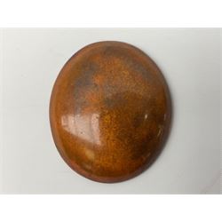 Henry George Murphy (1884-1939), collection of seven Arts & Crafts glazed ceramic roundels, of circular and oval form, five in tones of red and brown and two in tones of blue, turquoise and green in soufflé and high fired finishes, largest example D6.5cm