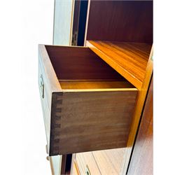 Ashton Leach & Cumberbirch Ltd., Rochdale - early 20th century walnut and mahogany gentleman's wardrobe, arched moulded top with book-matched figured walnut veneers, double doors enclosing fitted interior with hanging rail, tie rack and drawers, raised on cabriole supports