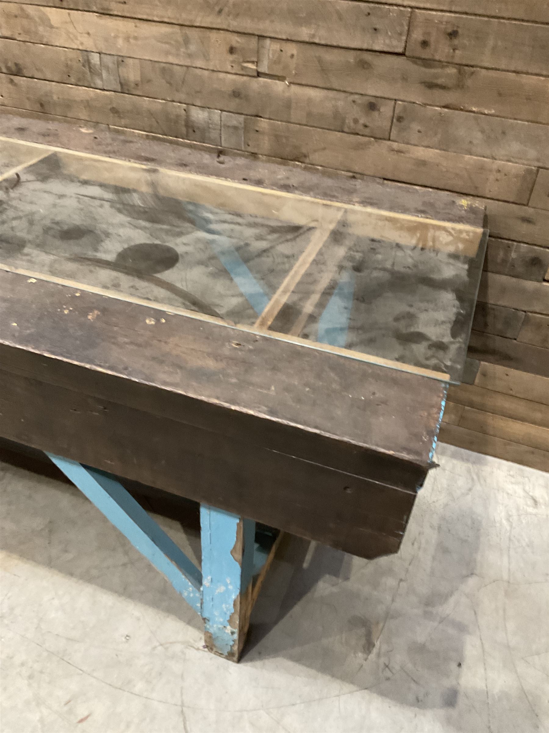 Large timber work bench with central glass section, and two pairs of vintage wooden step ladders (3)