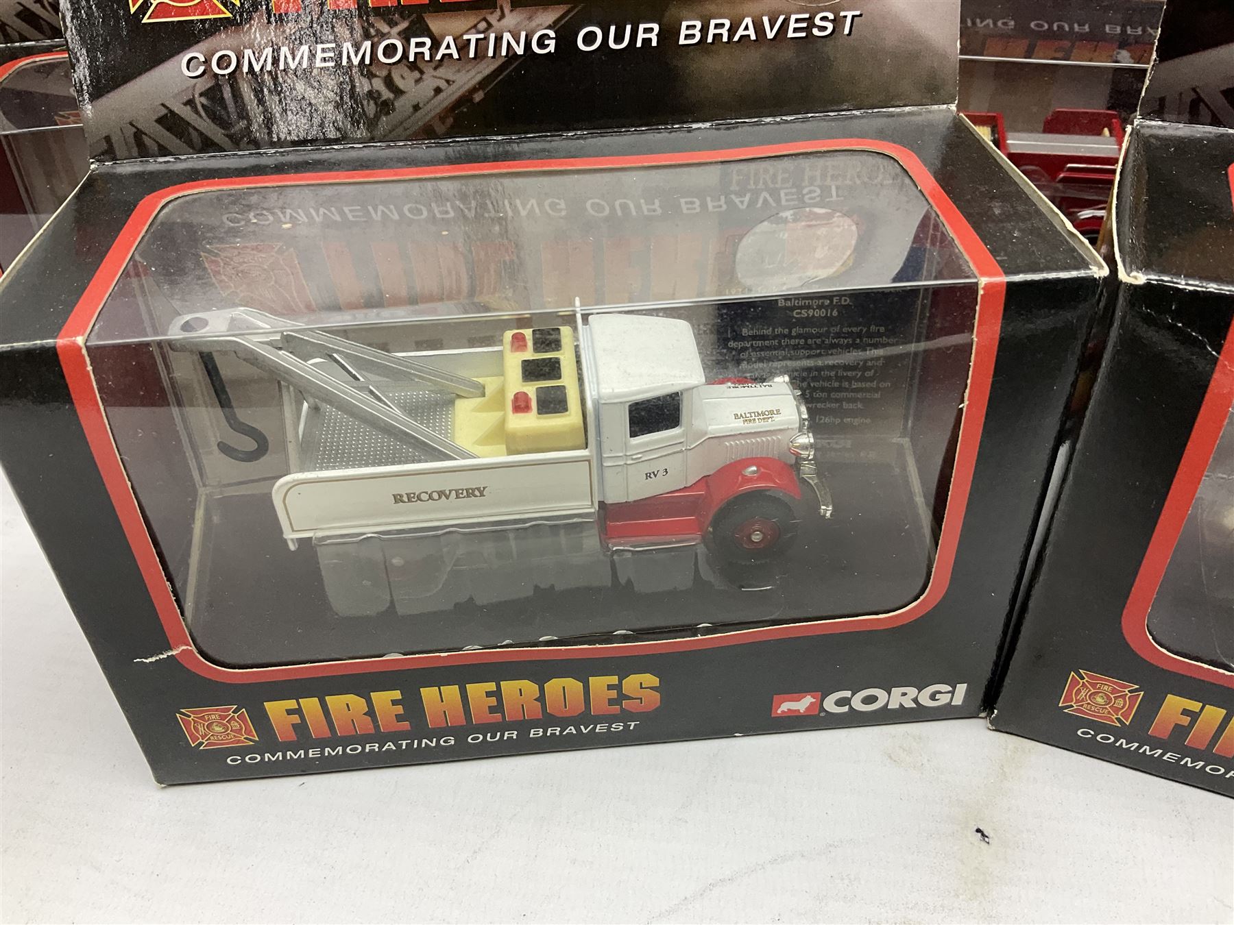 Corgi - eleven fire-fighting vehicles comprising limited edition 54706 E1 Side Mount Washington DC and 54902 E1 75ft Ladder Duncan Fire Department; 97392 Simon/Dennis Hydraulic Platform; 97361 AEC Turntable Ladder;  and seven 'Fire Heroes'; all boxed (11)