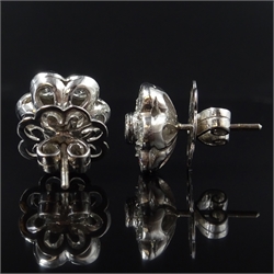  Pair of 18ct white gold flower head stud ear-rings, hallmarked  