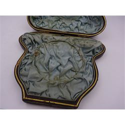 Victorian silver bowl, with embossed floral decoration and beaded rim, gilt interior and two applied shield cartouches, upon stepped circular foot, with a silver apostle spoon, with gilt bowl, both hallmarked George Unite, Birmingham 1883, bowl H5.5cm, within fitted tooled leather, silk lined case