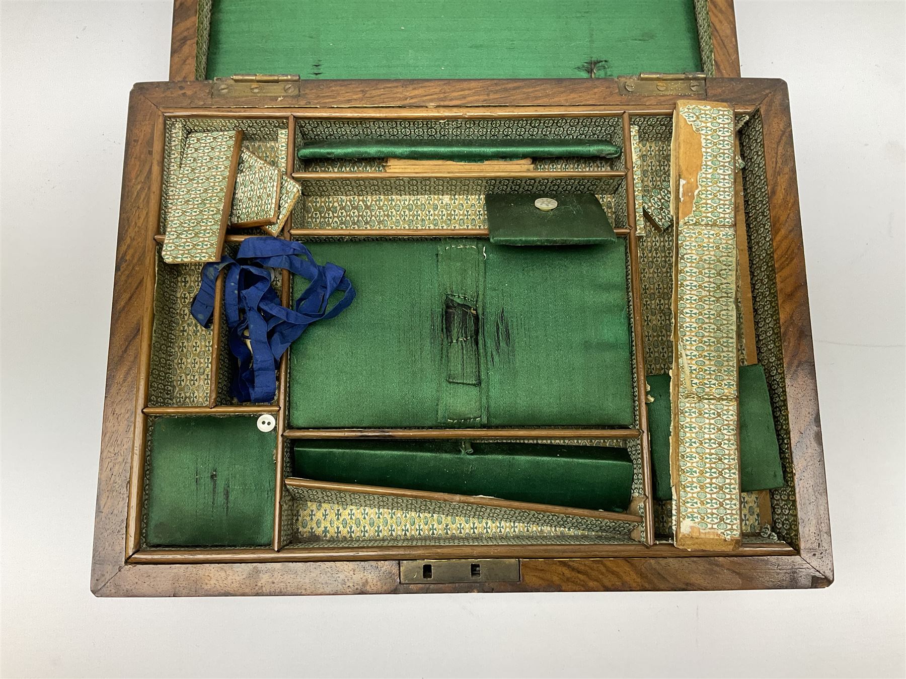Victorian walnut sewing box, the hinged lid decorated with inlaid backgammon and cribbage board lifting to reveal lined compartmented interior with lift out tray