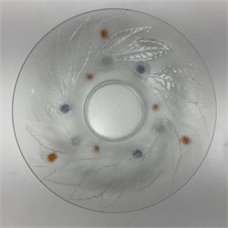 Two French pressed glass bowls of shallow circular form, relief moulded with flowers and foliage, together with a matching charger, largest bowl D34cm  
