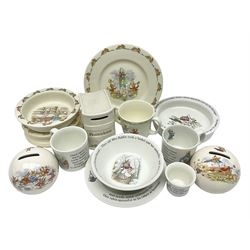 Collection of Royal Doulton Bunnykins and Wedgwood Peter Rabbit nursery ware, including cups, bowls, money boxes, etc 