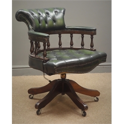  Leather swivel desk chair, upholstered in a dark green leather, deeply buttoned, five splayed supports  