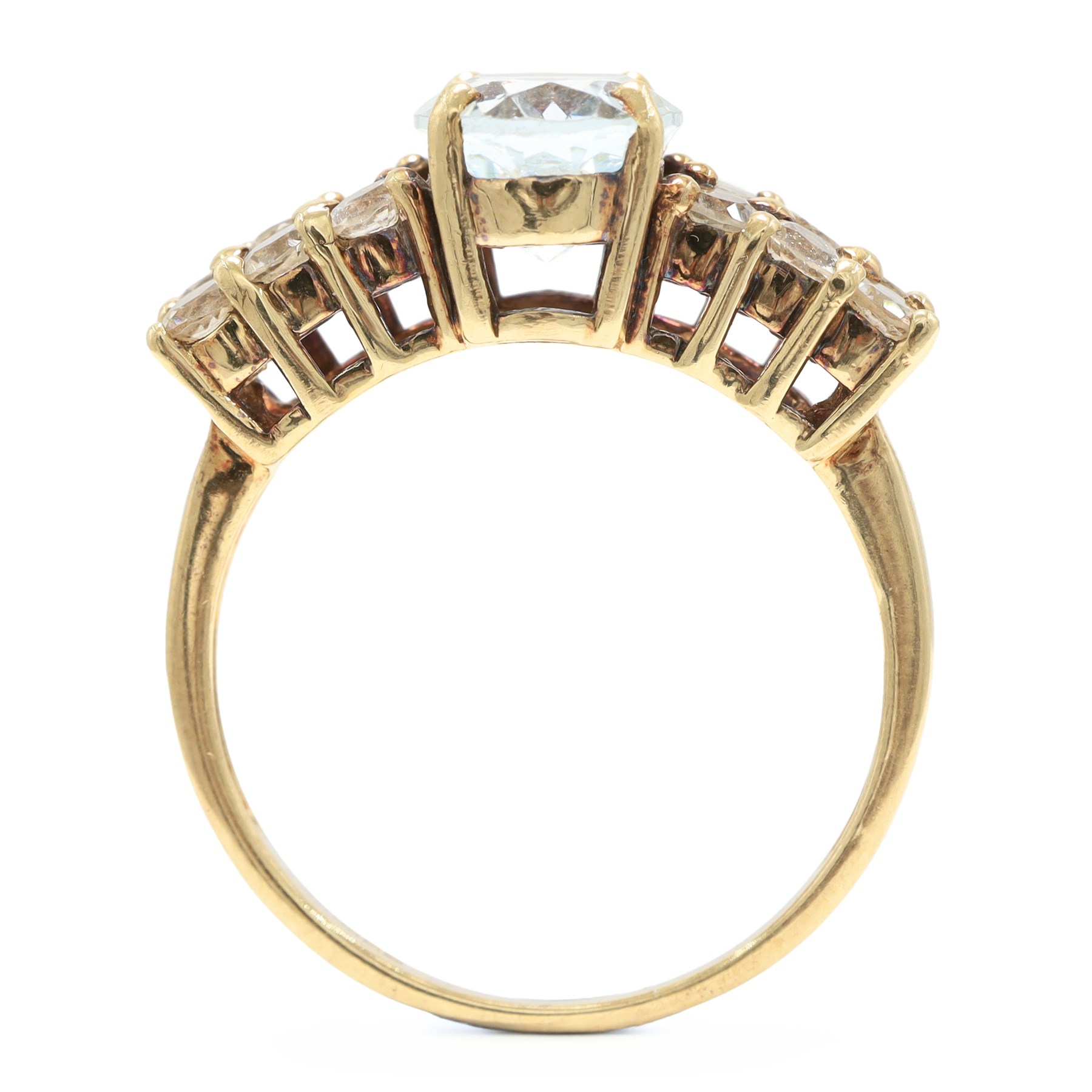 9ct gold aquamarine and blue topaz ring, single oval cut aquamarine, with two rows of round cut topaz's set either side, hallmarked