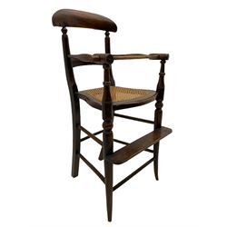 Victorian stained beech child's highchair, with cane seat on turned out spayed supports 