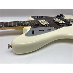 Mexican Fender Jaguar electric guitar with Humbucker pick-ups and tremolo arm, serial no.MX16741977, L101cm; in soft carrying case