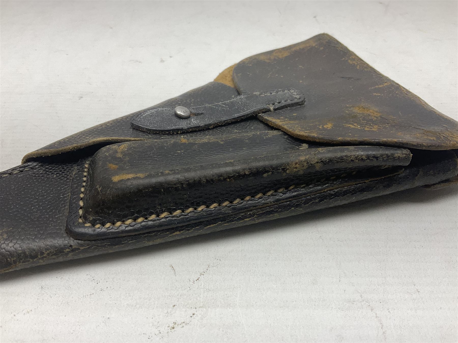 WW2 German P38 auto pistol leather holster with magazine pouch; marked P38 verso and CXB 4 H24cm