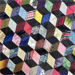19th Century silk and satin tumbling blocks pattern patchwork quilt with black border 228cm X 196cm