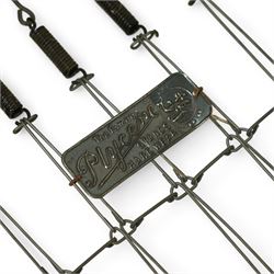 *Mid 20th century nursery set, comprising a cream painted metal cot with adjustable base, a wicker baby basket on wheeled stand, and a folding nursery screen with printed fabric panels decorated with playful animal and teddy bear motifs

Cot (H 112cm, W 136cm, D 77cm)
Screen (H 139cm, W 148cm) 
Basket (H 72cm, W 59cm, D 40cm)From the Kirkham Hall Attic & Cellar Collection, sold without reserve