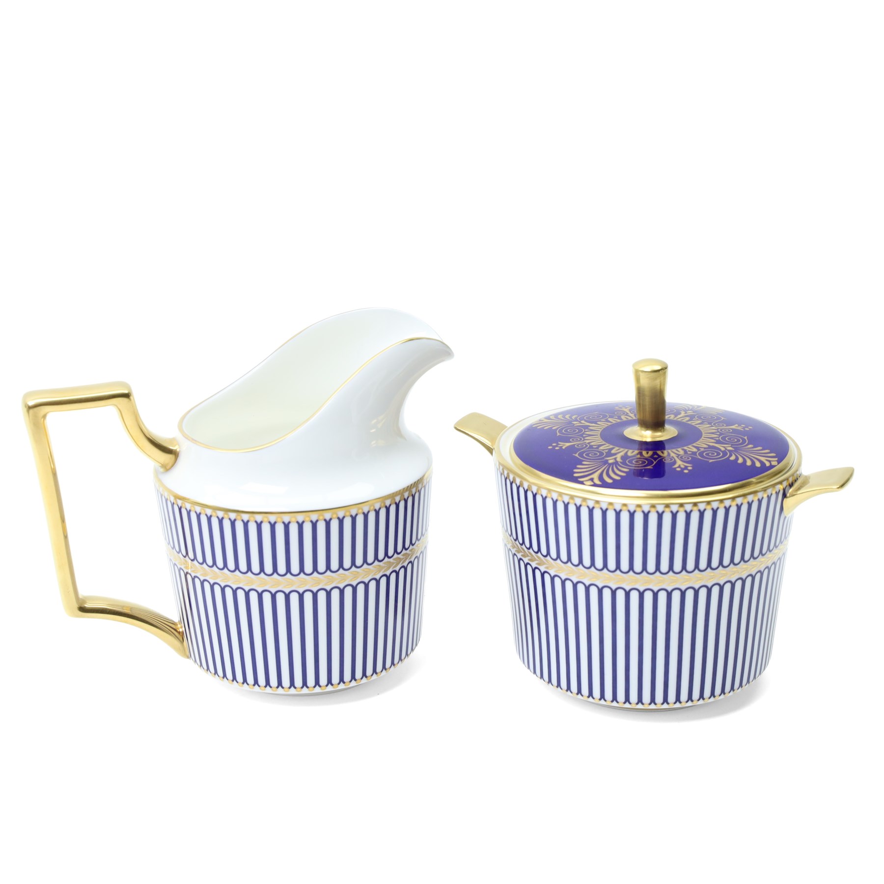 Wedgwood Anthemion Blue pattern tea service richly decorated in blue and gilt with palmette and colonnade forms comprising six cups and saucers, six plates, tea pot, milk jug and sugar box and cover