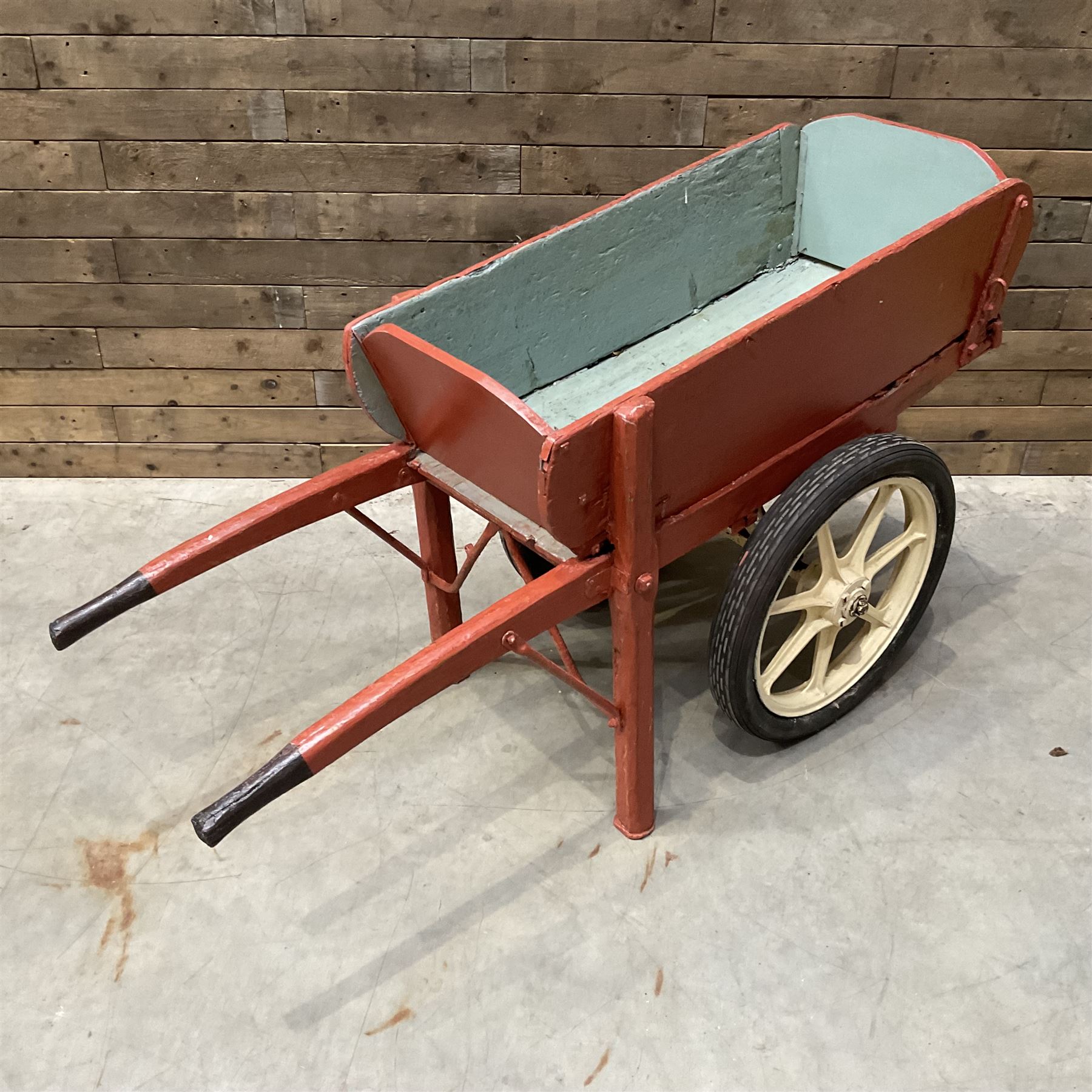 Painted timber hand cart on cast iron wheels