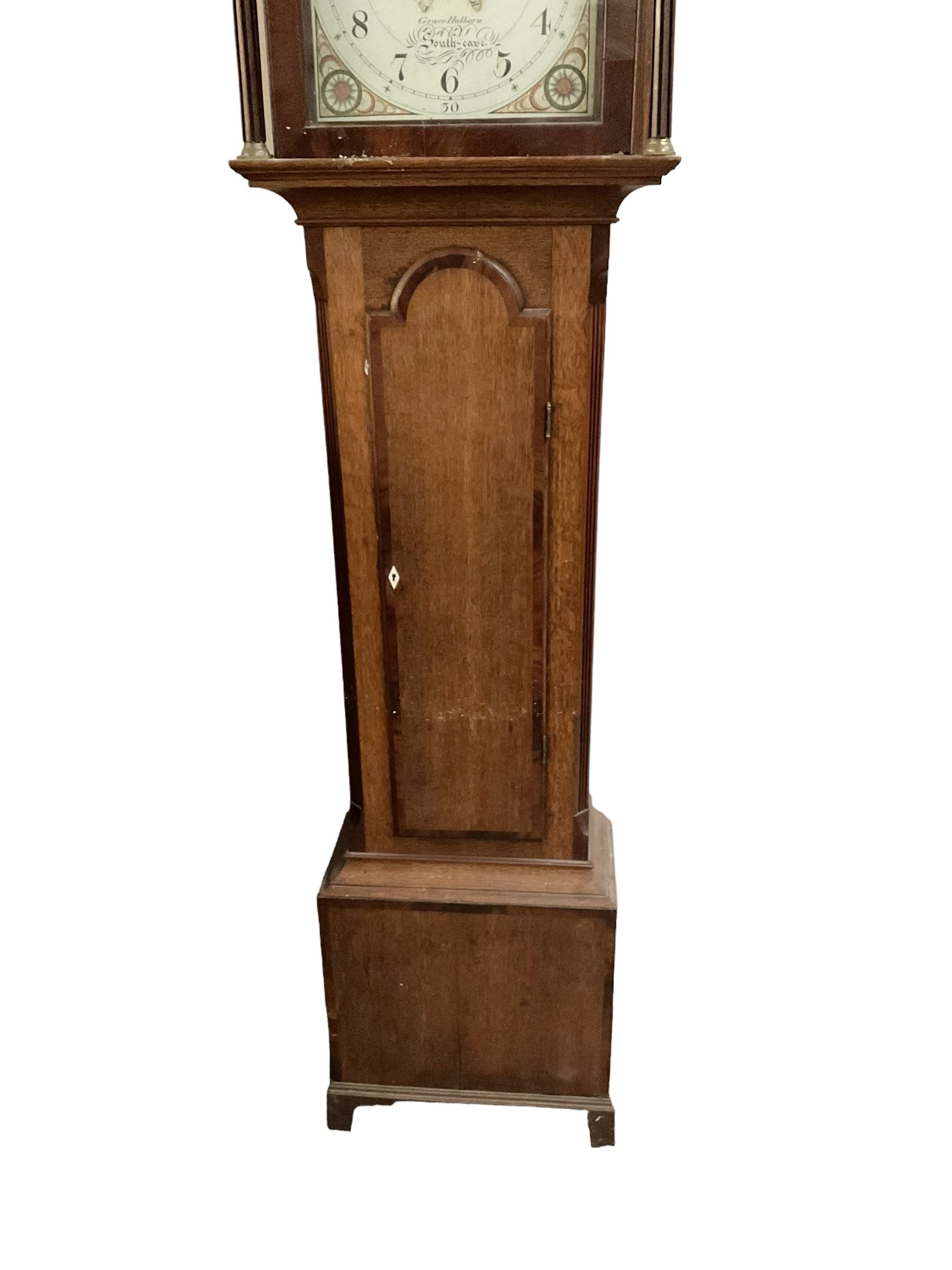 Grace Holborn of South Cave (Nr Hull Yorks.) -  Oak and mahogany 8-day longcase clock, c1820, with a pagoda topped pediment with inlay and three ball and spire finials, break arch painted dial flanked by two reeded pilasters with brass capitals, trunk with canted corners and a full length break arch door, square plinth on bracket feet, dial with upright Arabic numerals and geometric painted spandrels, depiction of an eagle and a snake to the arch,  with a seconds dial and calendar aperture, brass hands and seconds pointer, rack striking recoil anchor weight driven movement, striking the hours on a bell. With weights and pendulum.
Grace Holborn was most probably the widow of Charles William Holborn who was a clockmaker in South Cave 1759-1811.