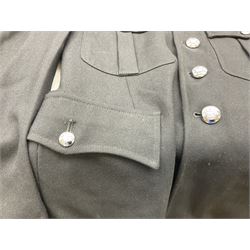 LNER Police cape; indistinctly dated 1943(?); York & North East Yorkshire Police belted tunic; belted tunic with Chief Constable epaulettes and buttons; and another tunic with staybrite Queens Crown buttons (4)