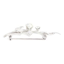 18ct white gold diamond flower brooch, set with a principal old cut diamond of approx 1.00 carat, surrounded by three further old cut diamonds, total diamond weight approx 1.75 carat