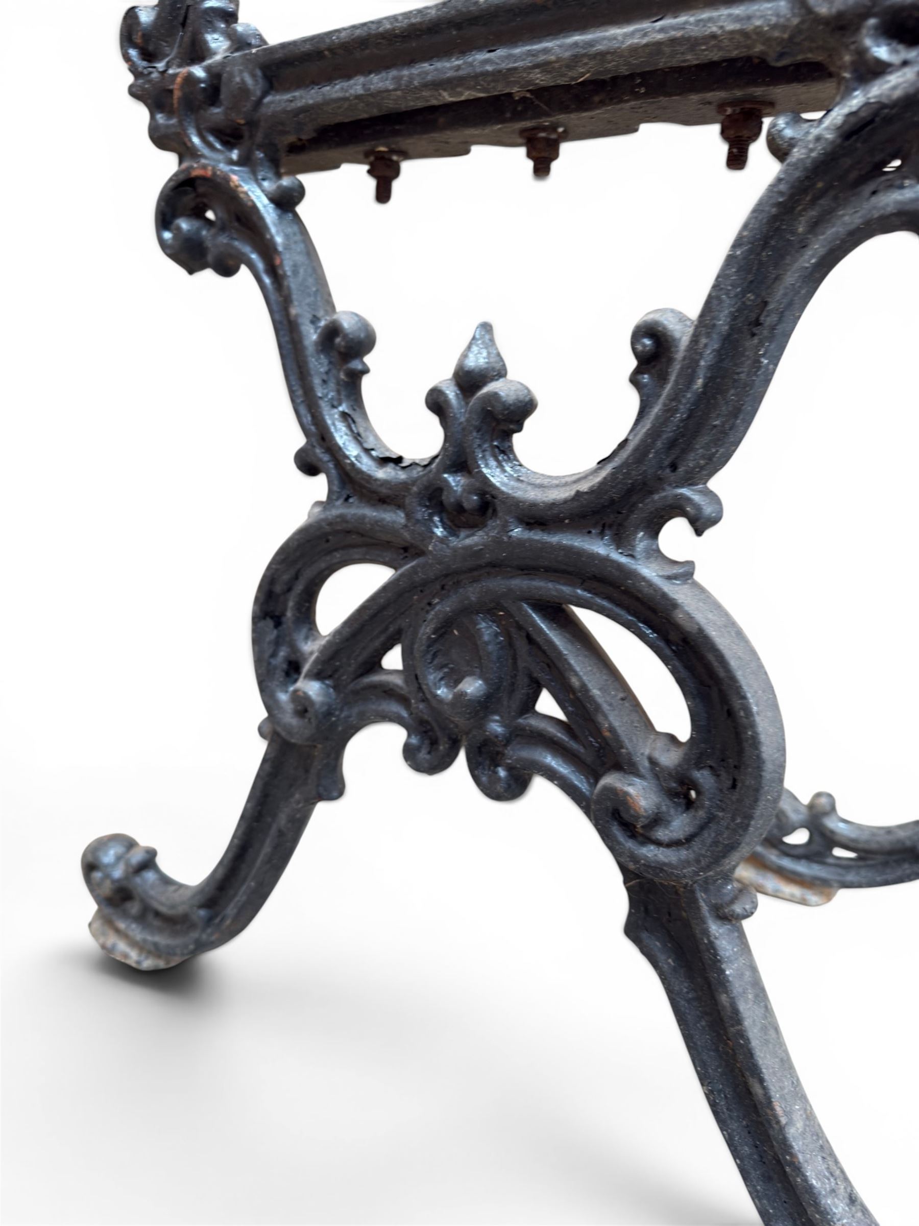 Carron Foundry - two pairs of 19th century cast iron garden bench ends, ornate detail with arms and X shaped legs,finish in black paint, the design no. 110396, first registered 13 July 1857 (see illustration), width as desired