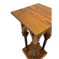 19th century pitch pine ecclesiastical pedestal stand, the square chamfered top over cusped Gothic pointed arches and four turned column supports, stepped and moulded plinth base