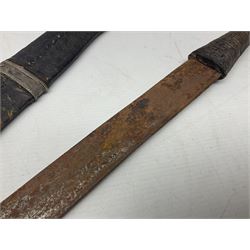 Omani presentation sword kattara, with 77cm  broad slightly curved single edge blade with two fullers, leather bound hilt woven with silver wire decoration and iron pommel;  in tooled leather scabbard with chased silver mounts and presentation plaque 'To Capt. D.M. Naylor From C Company NFR Oman Dec 1962' (Northern Frontier Regiment) L99cm overall