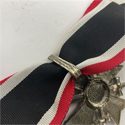 Four German awards c1957 - Knights Cross of the War Merit Cross, War Merit Cross 1st Class, Faithful Service Cross and Silver Wound badge (4)