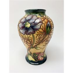 A Moorcroft vase, of baluster form, circa 2000, decorated in the Cosmos pattern, with impressed and painted marks beneath, H15.5cm. 