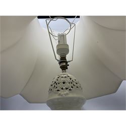 Modern pierced oriental white ceramic vase shaped table lamp, together with a blue and white baluster shaped example decorated with figures upon elephants, both with shades, tallest H83cm incl shade