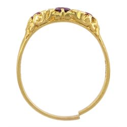 18ct gold three stone ruby and four stone round brilliant cut diamond ring, London 1975
