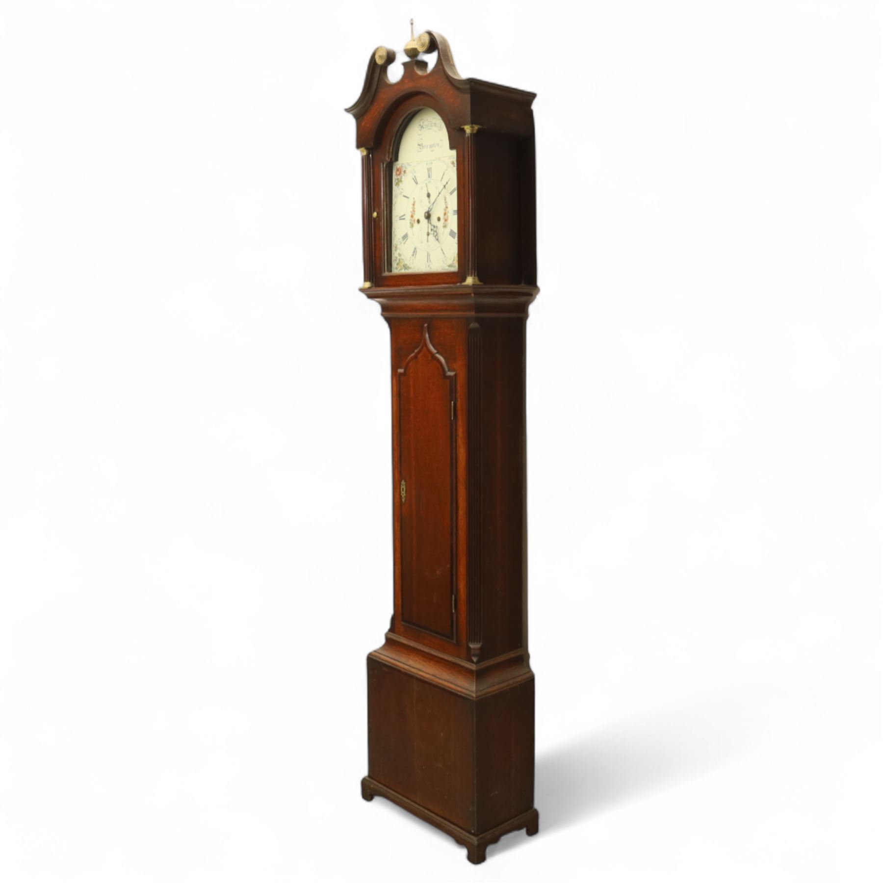 Thomas Hawkswell of Brompton (Nr Pickering-Yorks), 8-day oak cased longcase clock with a swan necked pediment and central brass finial, break arch hood door flanked by reeded pilasters with brass capitals, trunk with canted corners and a spire topped door, square plinth raised on a shaped skirting, painted dial with floral spandrels and makers name to the arch, with Roman numerals, calendar and seconds dial and pierced steel hands, dial pinned to a twin train rack striking movement, striking the hours on a bell. With weights and pendulum.
