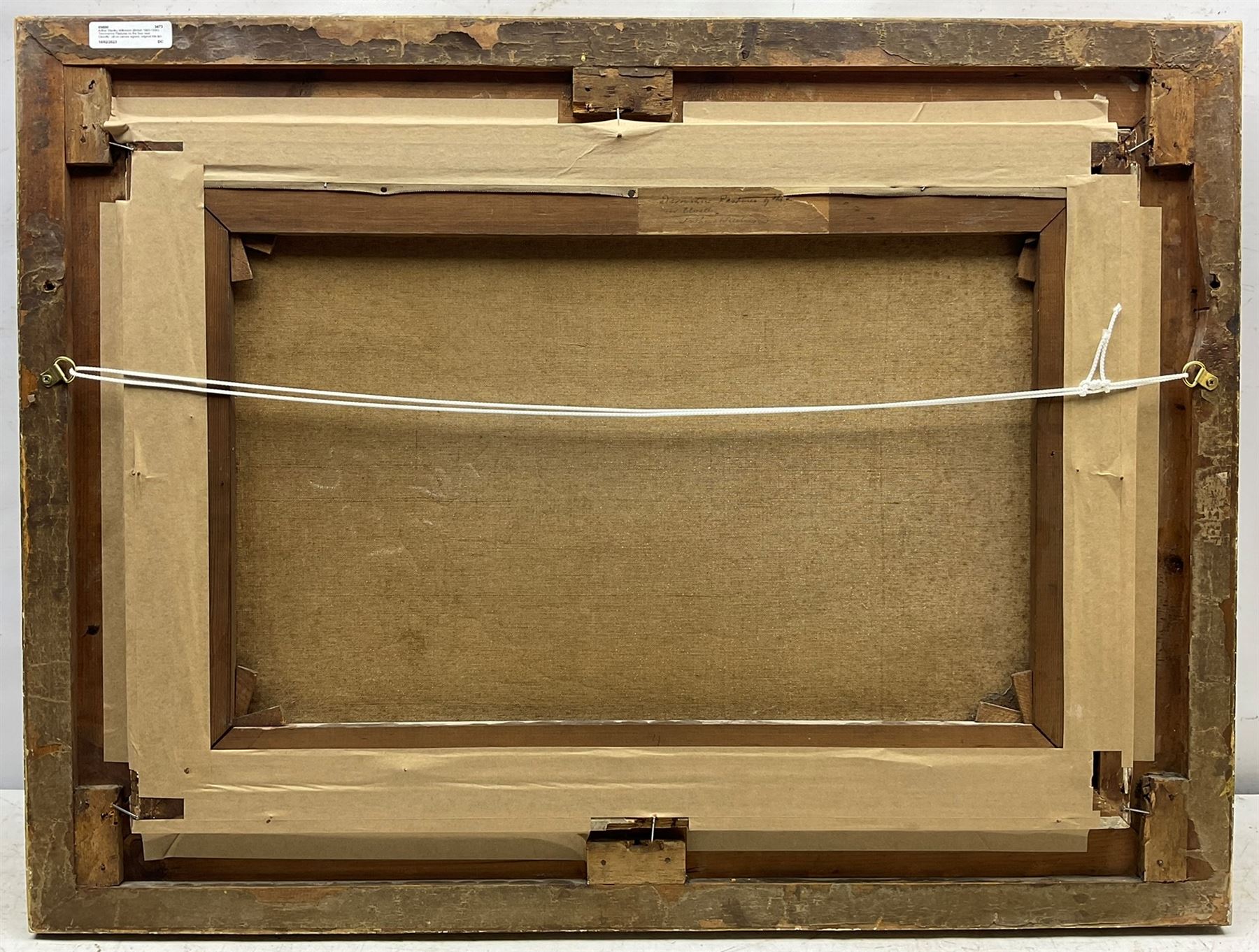 Arthur Stanley Wilkinson (British 1860-1930): 'Devonshire Pastures by the Sea near Clovelly', oil on canvas signed, original title label verso 40cm x 60cm