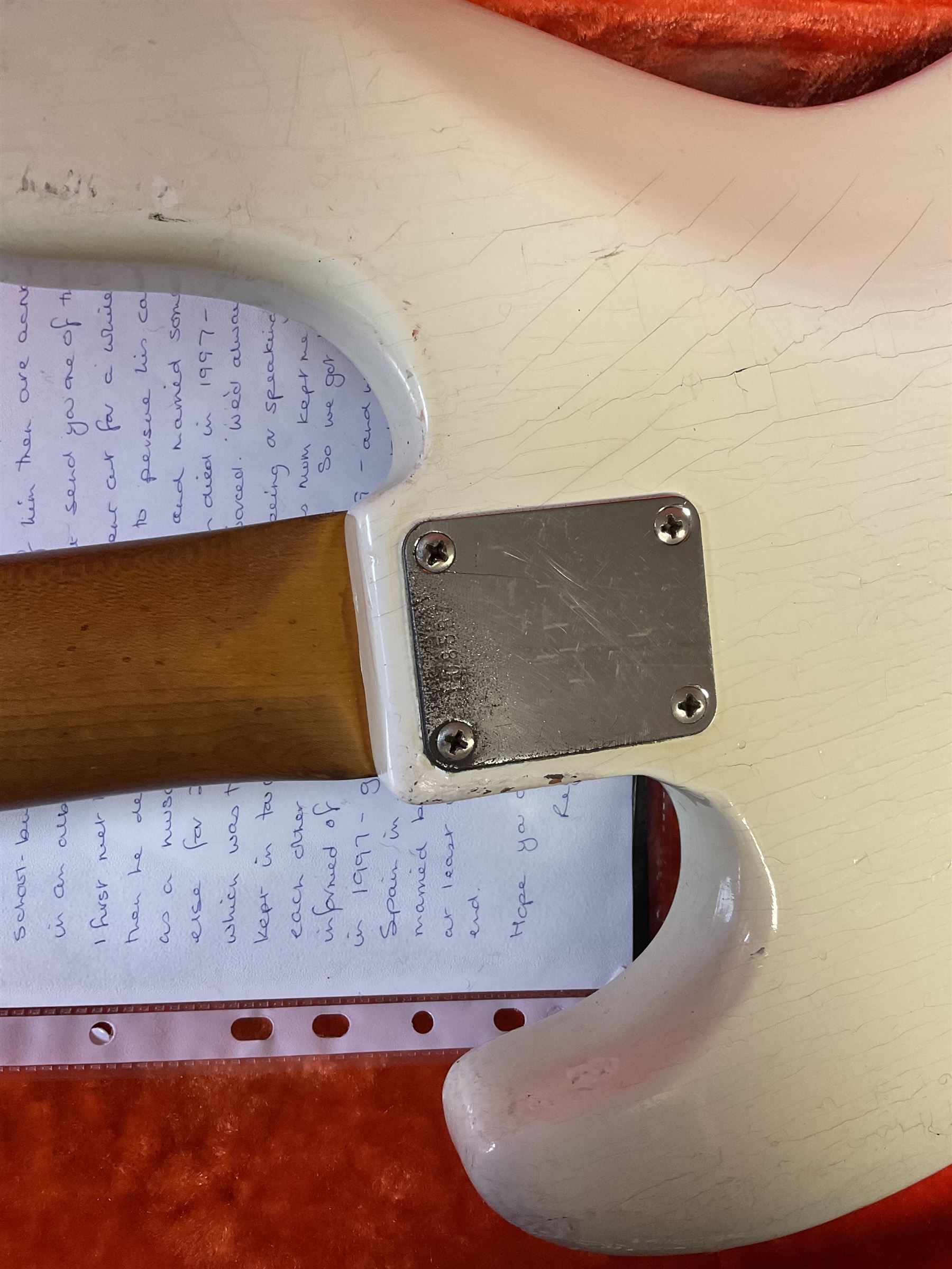 1963 Fender Jazz three-knob bass guitar; impressed with date code 7AUG63A on end of neck and serial no.L08587 on back plate; all original but re-finished in white in the 1970s; sold with photographs of the instrument in the 1960s with original finish and in the 1970s re-finished; L117.5cm; in original hard carrying case; Provenance: the professional guitar of Howard Livett from new to his death in 2005. Howard played in The Humperdincks, the backing group for Englebert Humperdinck, also played in the backing group for Max Bygraves and in the band Hedgehoppers Anonymous. The guitar is also sold with a manuscript letter of provenance from Howard's wife.