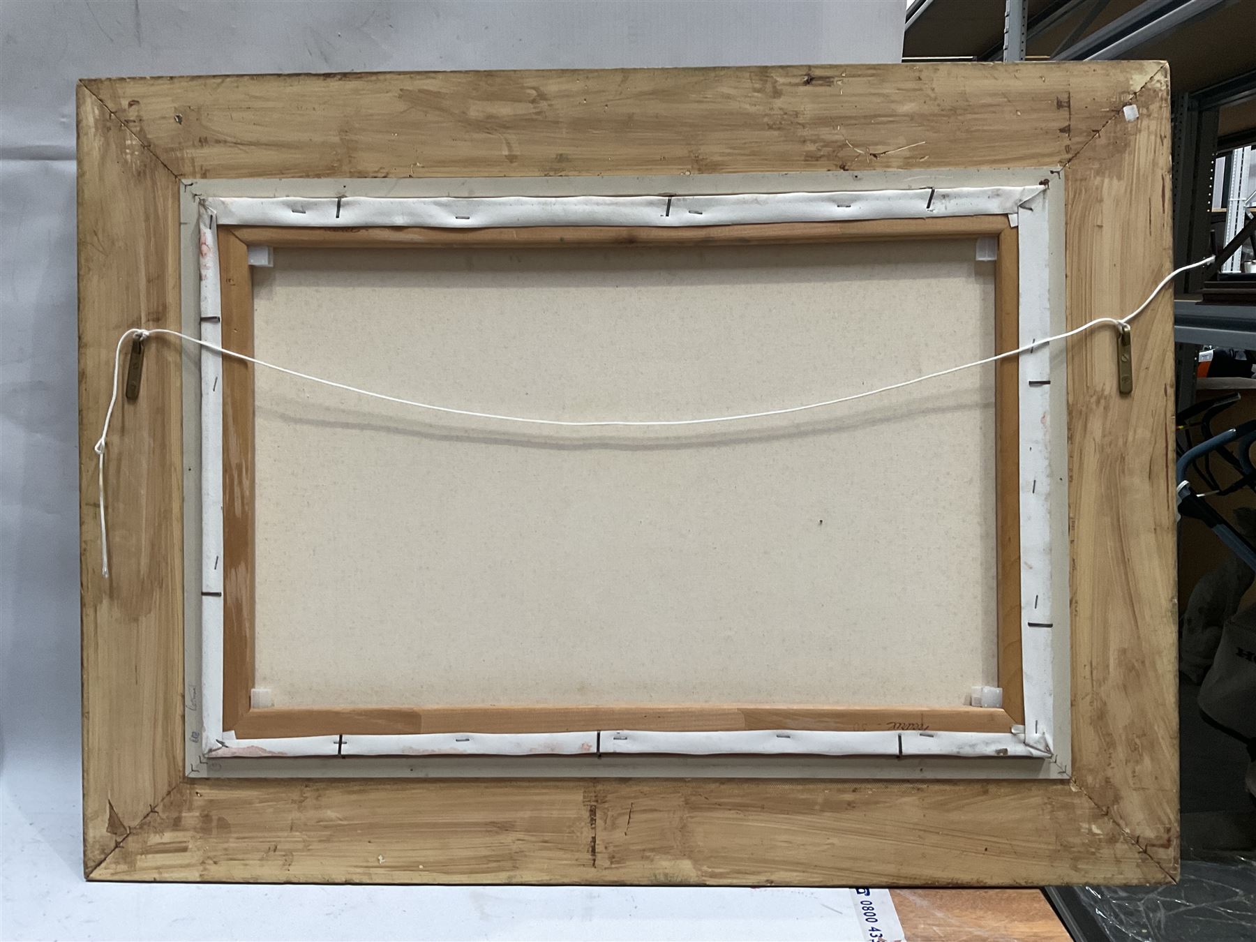 Ivan Taylor (British 1946-): Fields and Town Church, oil on canvas signed 49cm x 74cm 