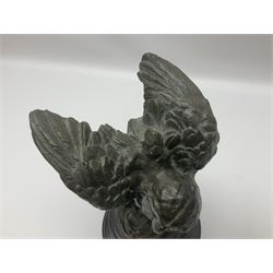 Bronze figure, modelled as an owl upon a rock, on stepped circular base, after Milo, H24.5cm