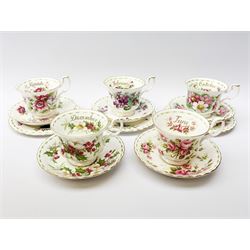Royal Albert 'Flower of the Month' series cups saucers and plates comprising: March trio, February trio, October trio, June cup & saucer and December cup & saucer 