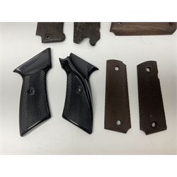 Six pairs of revolver grips;  pair of Lightwood & Son Ltd powder/shot measures in original box; and boxed Colt hammer shroud 