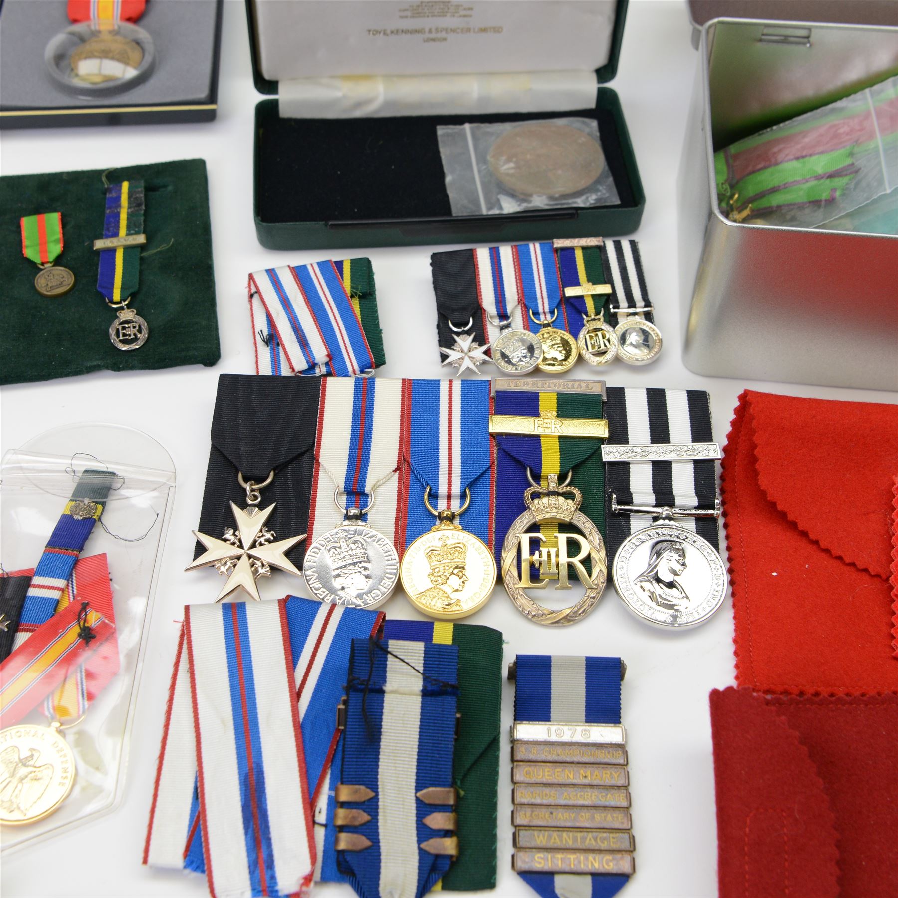 Collection of medals, insignias and minitures, including American National Defence medals, Efficiency Decoration medal, Order of St. John of Jerusalem stars, Military and Hospitaller Order of St. Lazarus of Jerusalem medals etc, several by Toye, Kedding & Spencer Ltd and Worcestershire Medal Service Ltd