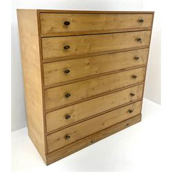 Blonde plywood and pine chest, six graduating drawers, platform base