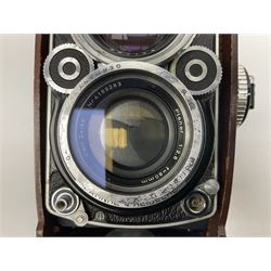 Franke & Heidecke Synchro-Compur Rolleiflex camera, twin lens camera, serial number 2447615, with viewing lens '1:2.8/80 Heidosmat No. 857174', Taking Lens '1:2.8/80 Carl Zeiss Planar No. 4189283', in leather case