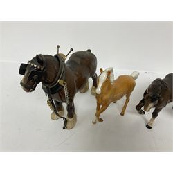 Group of Beswick figures of horses, to include a Palomino horse, Bay Shire horse, recumbent bay foal etc, all with printed marks beneath (5)