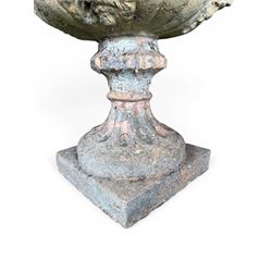 19th century terracotta campana shape urn planter, egg-and-dart moulded rim over a cherub-mask and gadrooned underbelly, turned pedestal and socle on square base