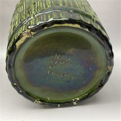 Jardiniere and stand, the jardiniere modelled as a pale, the stand with foliate and foliage decoration on a green ground, stand H73cm 