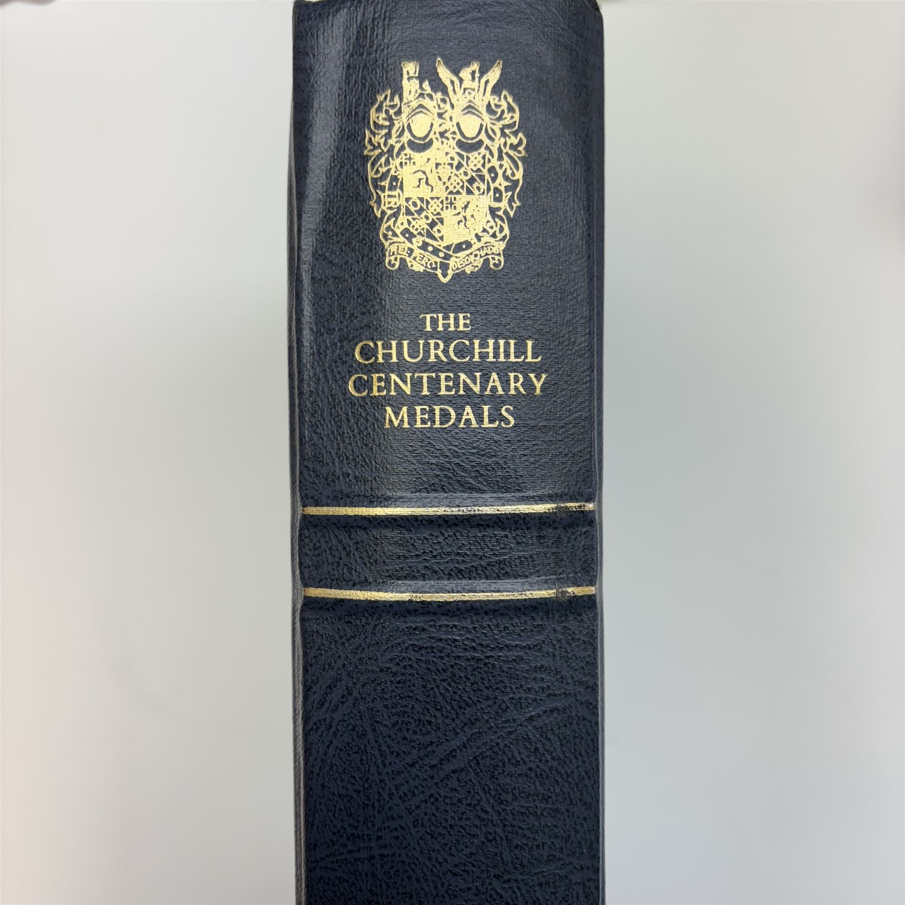 The Churchill Centenary Trust Medal Collection, 1974, a complete set of 24 silver-gilt medallions struck by John Pinches, issued by the Churchill Centenary Trust to commemorate the 100th anniversary of the birth of Winston Churchill; individually encapsulated with certificate of authenticity and housed in a leatherette display album