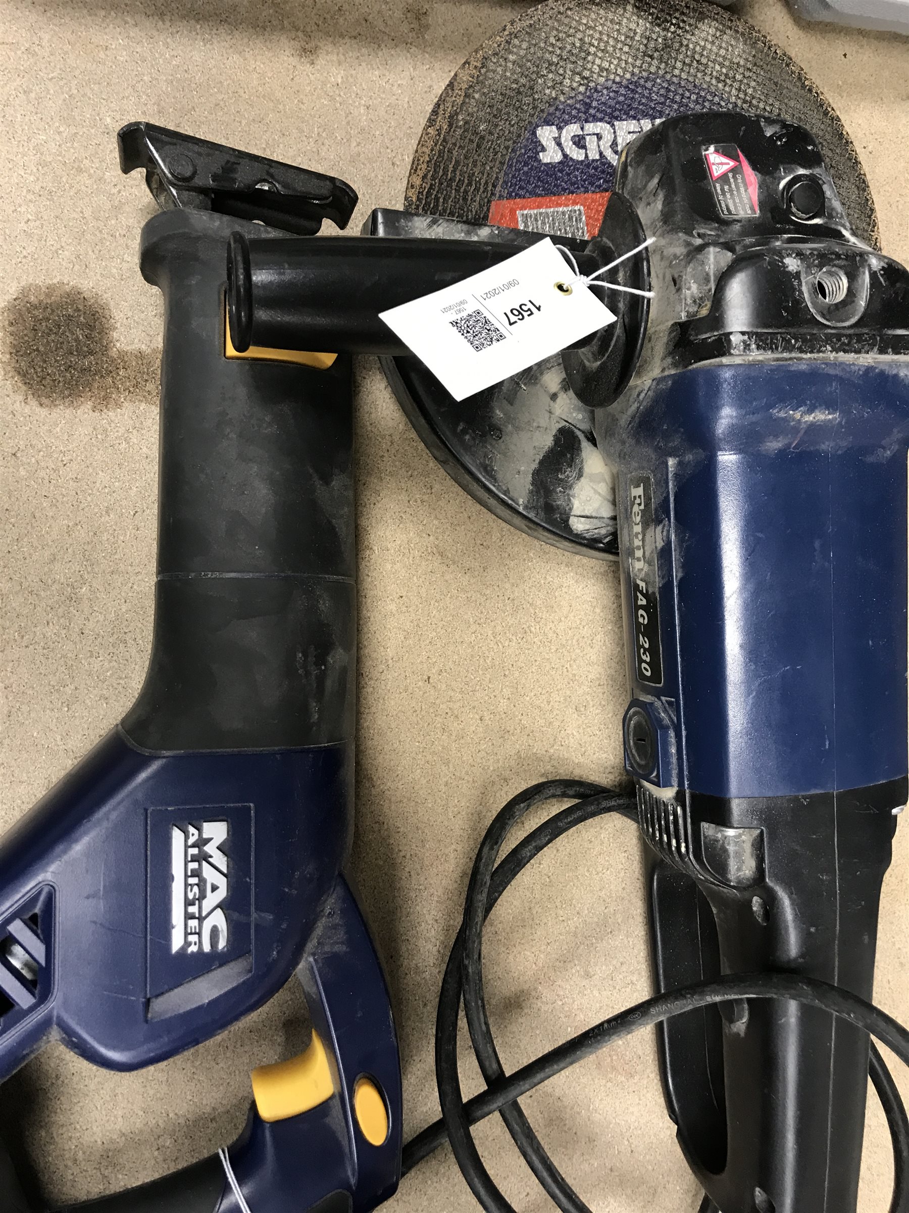 A quantity of hand tools including a Ferm FAG-230 angle grinder, a MacAllister reciprocating saw, a jig saw etc